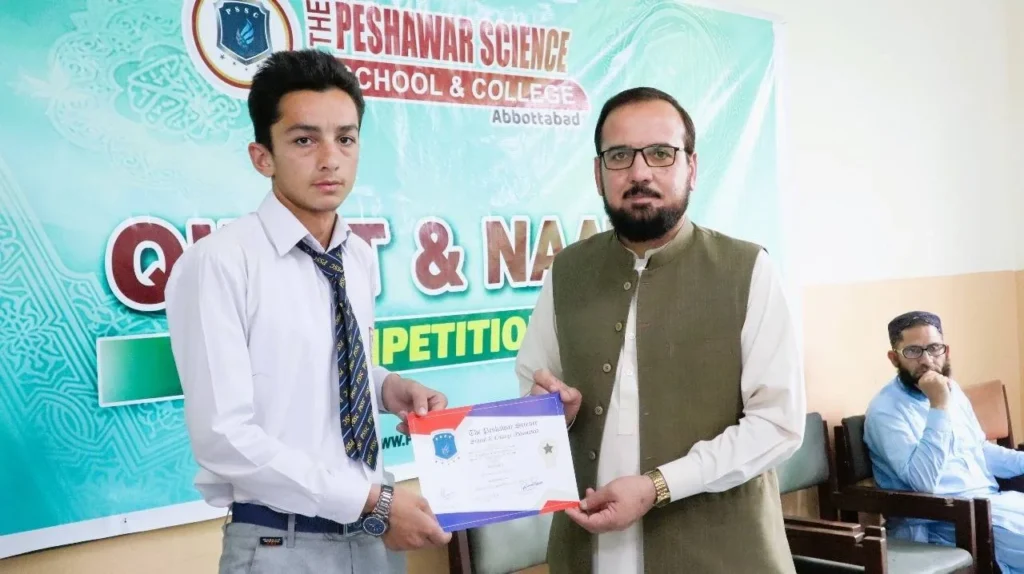 PSSC student receiving an award at a Naat competition